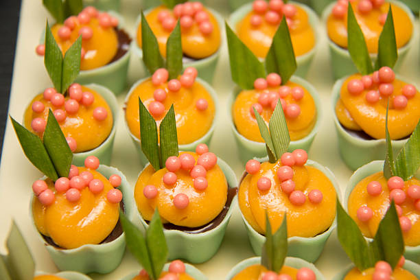 istock chocolate pralines  decorated on white dish 596381878