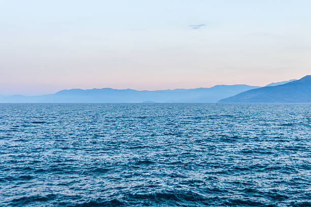 istock Sunset over the Aegean Sea in Greece 596382292