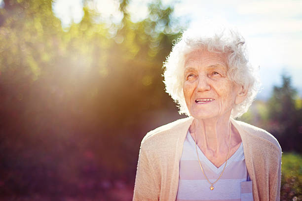 istock Senior Woman Smiling, Outdoors 596383172