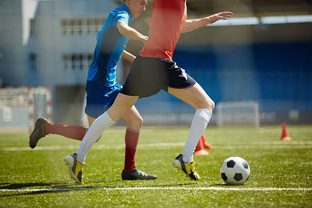 istock Running footballers 596383346