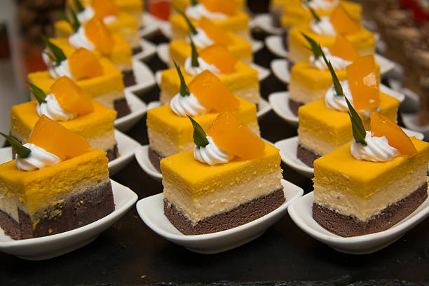 istock cut mini orang cheese cake  in mni white cup 596384658
