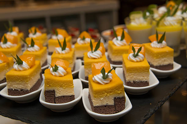 istock cut mini orang cheese cake  in mni white cup 596384692