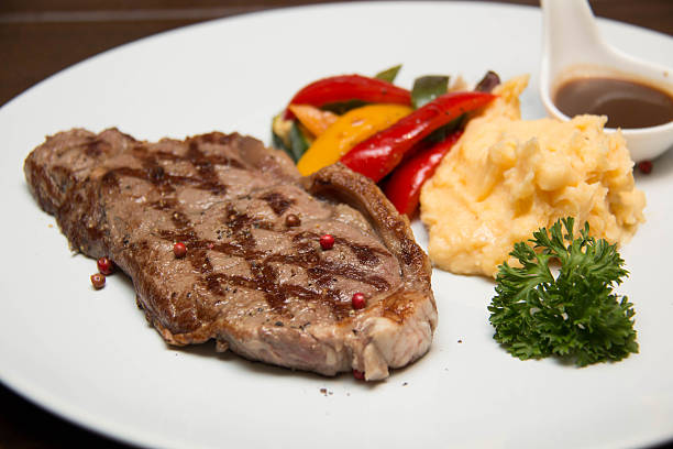 istock Sirloin steak and Grill vegetables 596385698