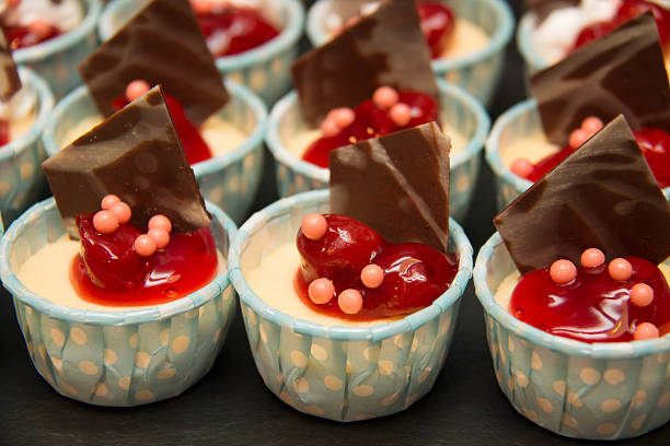 istock mini  cup cakes decorated cherry filling on top 596385992