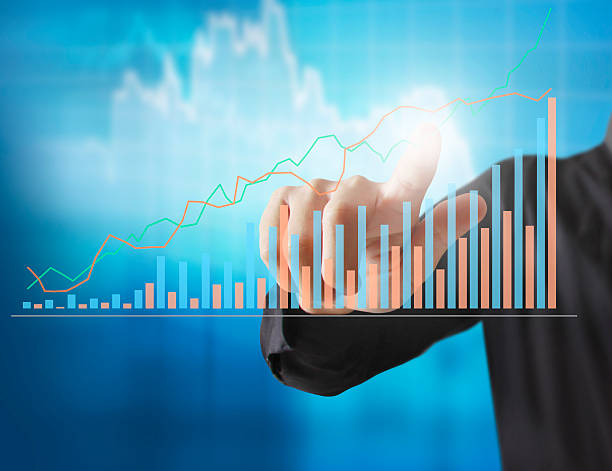istock financial symbols coming from hand 596386888