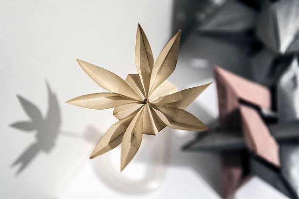 istock origami paper flower 596387216