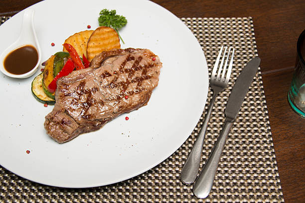 istock Sirloin steak and Grill vegetables 596387758
