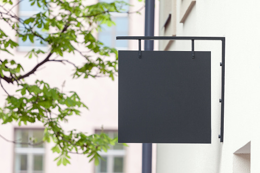 Black empty outdoor signage mockup to add company logo