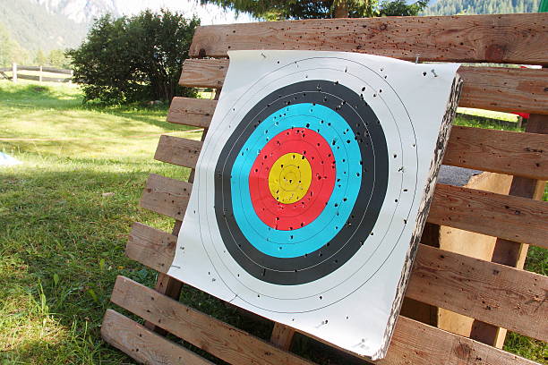 istock Used archery target on a wooden base 596389396