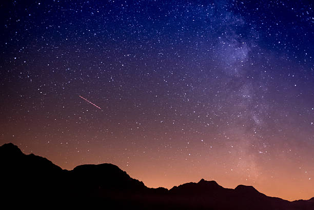 istock Starry night and milky way on the mountains 596390286