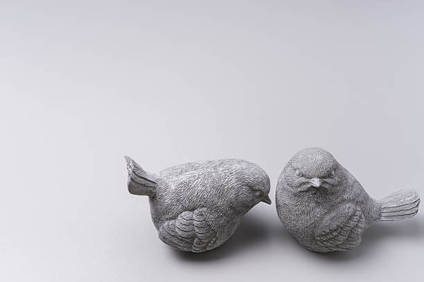 Two little bird ceramic use home decor with white background