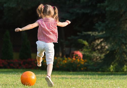 Little girl Shooting at Goal