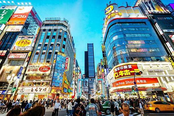 istock Zebra crossing in Shinjuku, Tokyo at sunset 596771792