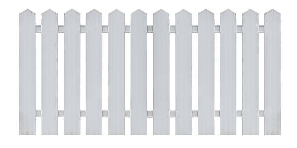 istock White wooden fence isolated on white 596771928