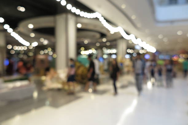 istock Shopping mall, modern trade with people in blur background 596774232