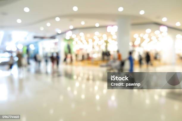 Shopping Mall Modern Trade With People In Blur Background Stock Photo - Download Image Now
