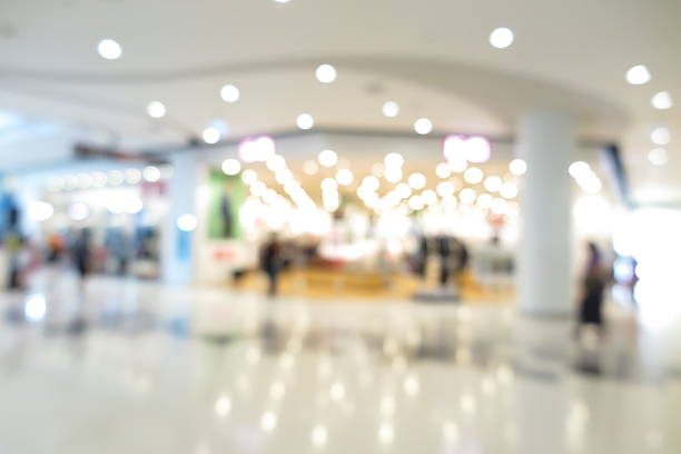istock Shopping mall, modern trade with people in blur background 596774504