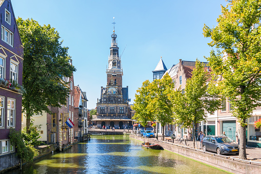 Alkmaar, Netherlands - August 17, 2016: Weigh house, Waag, from Zijdam canal in Alkmaar, North Holland, Netherlands