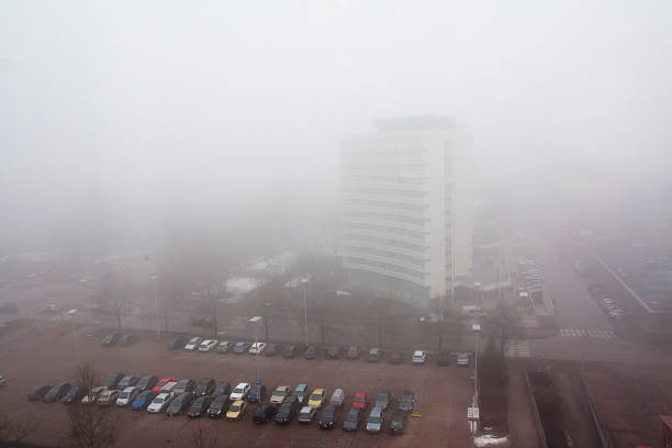 istock Car parking in the fog, top view 596776048