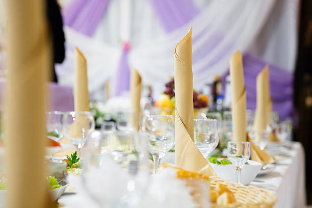 istock Restaurant table with glasses and napkins 596776192