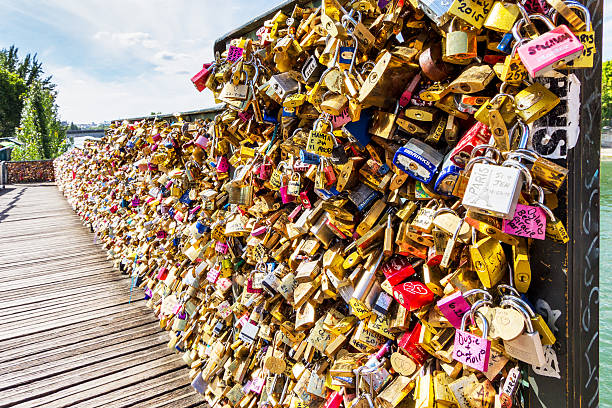 istock Locks of loving on the bridge in Paris. 596776934