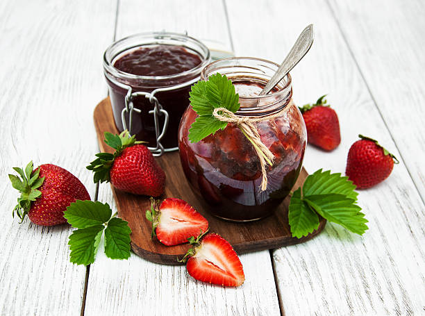 istock Strawberry jam and fresh strawberries 596777072
