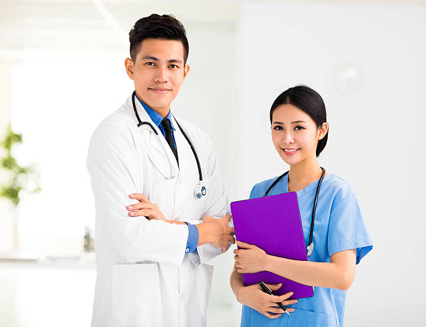 istock smiling Medical doctors working in the office 596777552