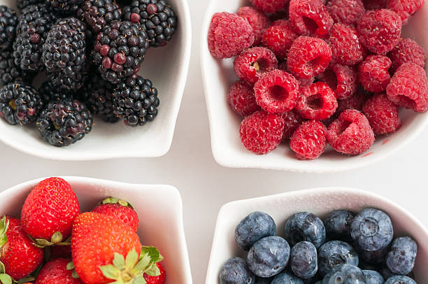 istock blueberries raspberries strawberries blackberries 596777934