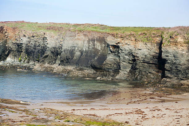 istock Wild beach, cliff, clear sky Galicia, Spain. 596779078