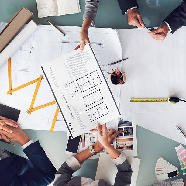 istock Business People Meeting Architecture Blueprint Design Concept 596779776