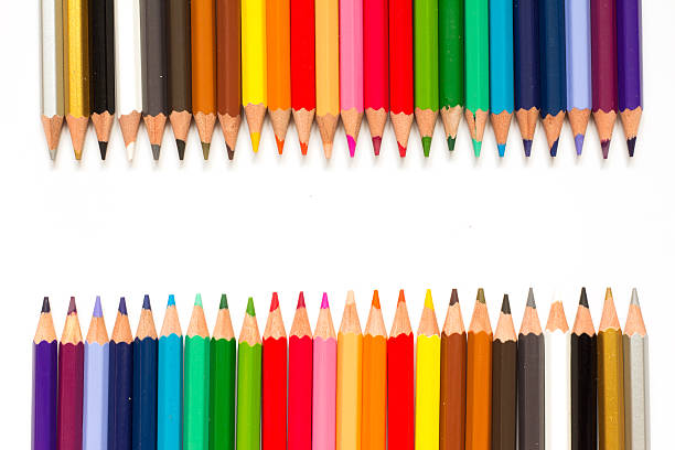 istock Row of color pencil on white background 596785354