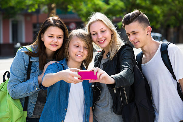 istock Teenagers doing selfie outdoors 596785800