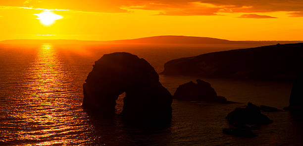 panoramic sunset over the virgin rock stock photo