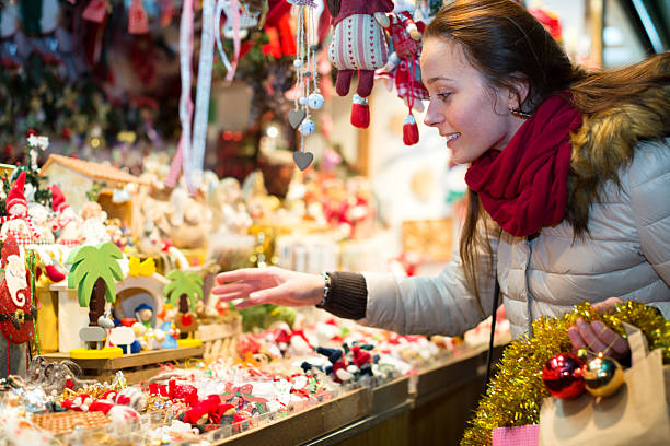 istock Female customer at the Christmas Fair 596787432