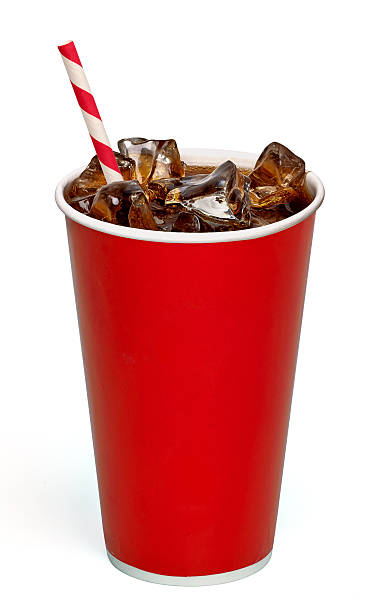 cola with straw in take away cup on white background - alcoholvrije drank stockfoto's en -beelden
