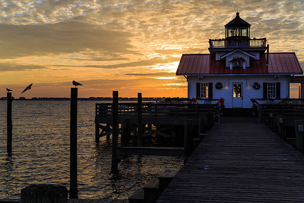 istock Manteo NC Marsh's Lighthouse at Christmas sunrise 596789846