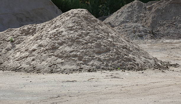 istock Heap of sand, an important construction material 596790142