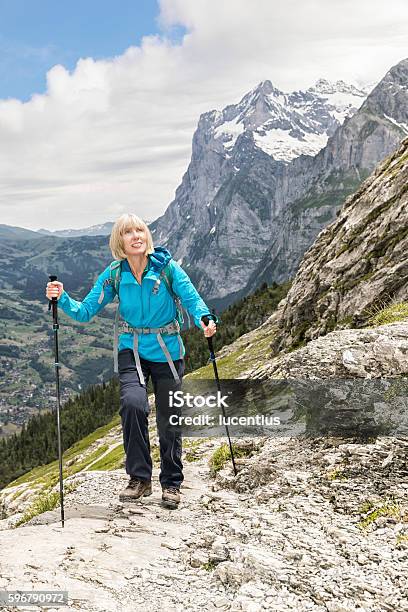 Female Hiker On Eiger Trail Switzerland Stock Photo - Download Image Now - Eiger, Footpath, Active Lifestyle