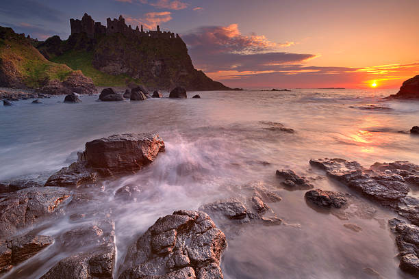 istock The Dunluce Castle in Northern Ireland at sunset 596791096