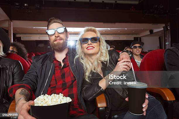 Bearded Man And Blonde Woman In The 3d Movie Theater Stock Photo - Download Image Now