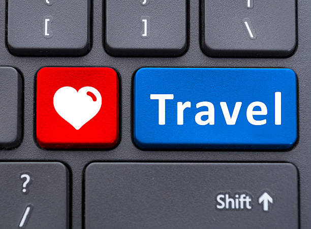 istock Travel and heart symbol text buttons on keyboard 596791674