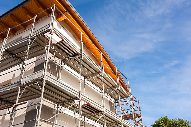istock Construction scaffolding of a building under renovation. 596791822