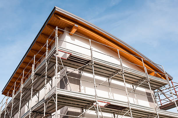 istock Construction scaffolding of a building under renovation. 596792116