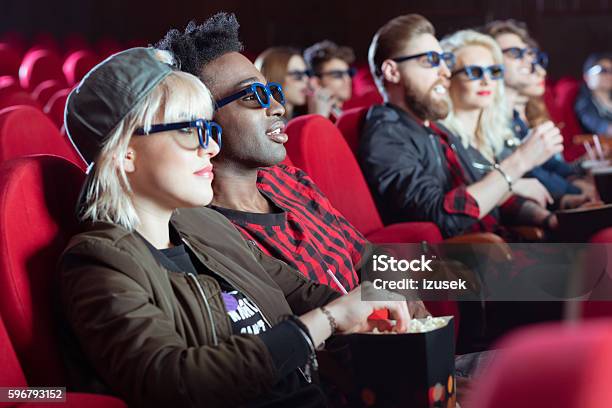 Multi Ethnic Group Of People In The 3d Movie Theater Stock Photo - Download Image Now