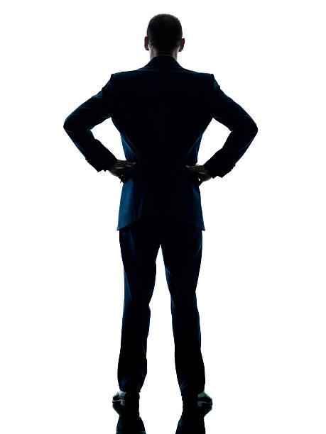 istock business man standing rear view isolated 596793402