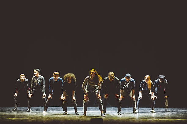 istock Group of young dancers on the stage 596793738