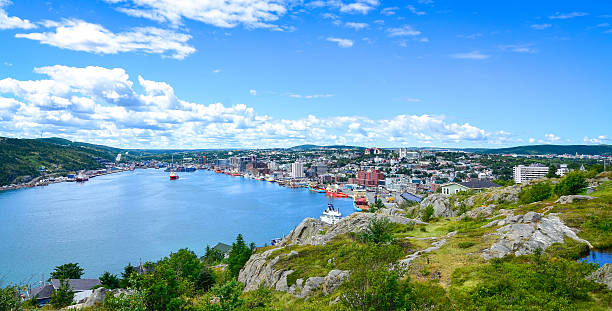 Panoramic view, St John's Harbour in Newfoundland Canada. St John's Harbour in Newfoundland Canada.   Panoramic view, Warm summer day in August. newfoundland & labrador stock pictures, royalty-free photos & images