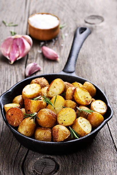 istock Roasted potato in frying pan 596795196