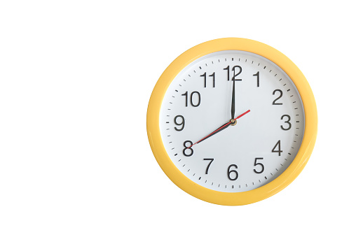 Yellow clock isolated on white background. Clipping path