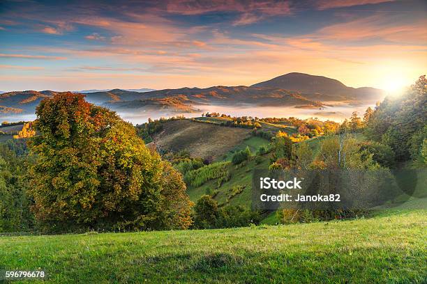 Colorful Autumn Landscape With Misty Valleyholbavtransylvaniaromaniaeurope Stock Photo - Download Image Now